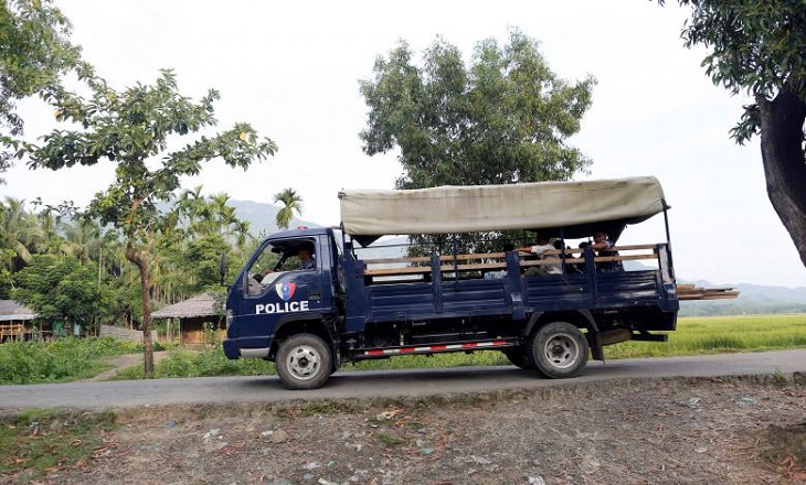 A police truck passes by a Rohingya village outside Maungdaw October 26, 2016. Picture taken October 26, 2016. REUTERS/Soe Zeya Tun